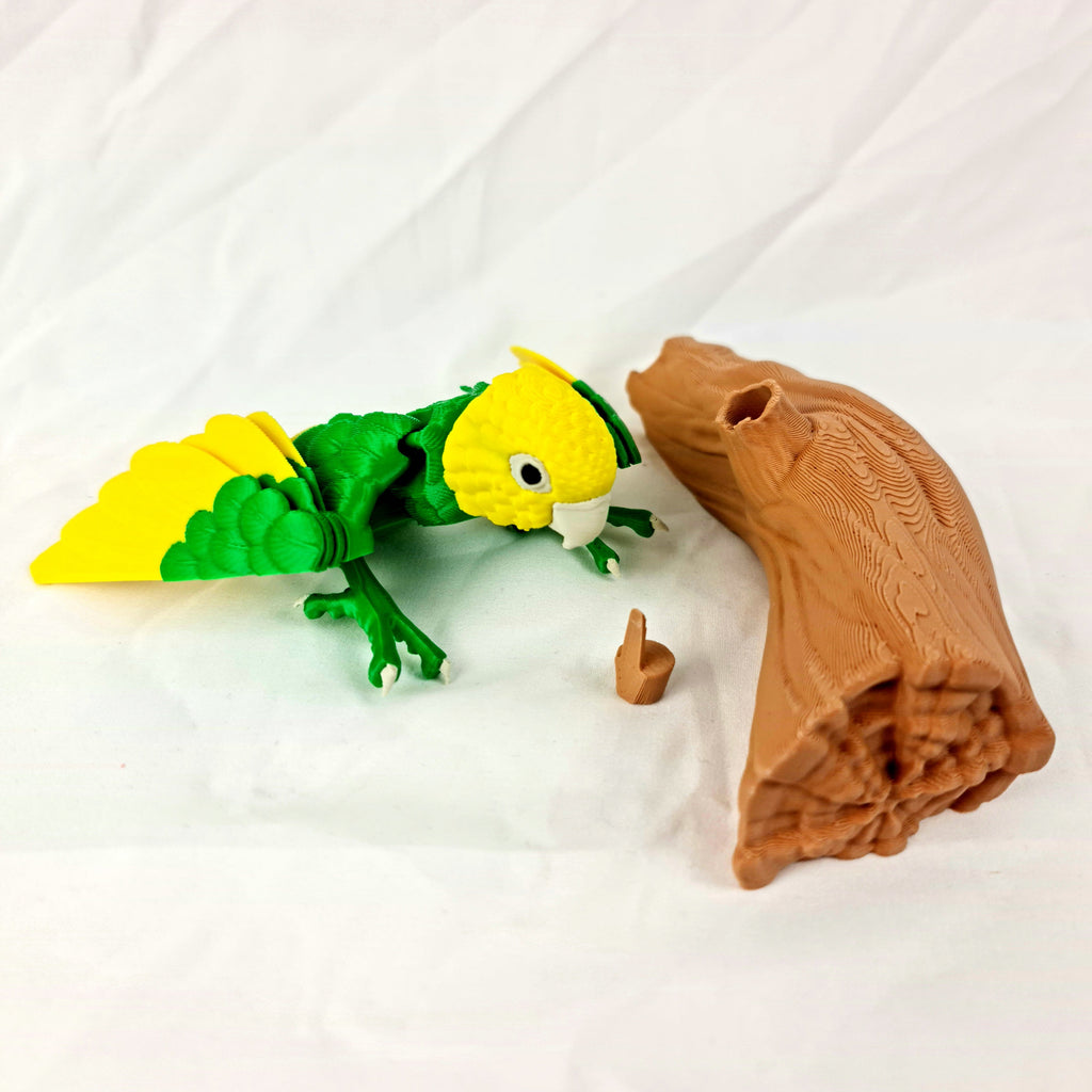 Losse geel-groene 3D-geprinte dwergpapegaai met montageschroef naast de bruine kunststof tak
