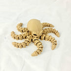 Vooraanzicht van de beige skelet octopus met duidelijk zicht op de scharnierende tentakelsegmenten.